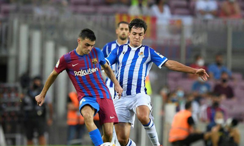 Pedri (left) has agreed a contract extension with Barcelona until 2026