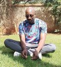 Sauti Sol's Bien Aime in an effortless t-shirt and jeans look