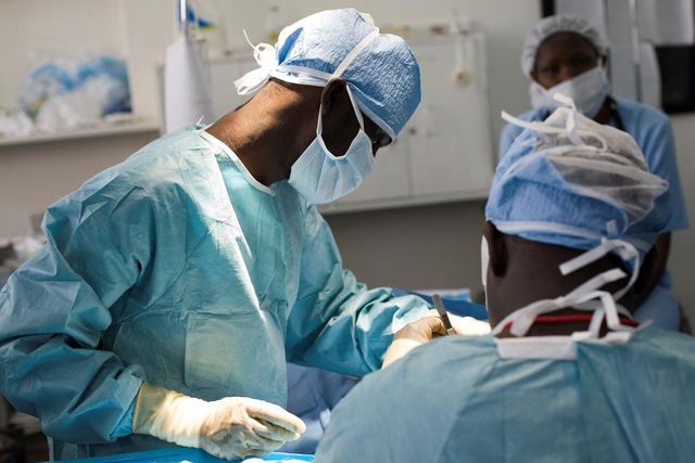 Kenyan health care workers in a theatre room
