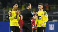 Dortmund midfielders Jude Bellingham (L) and Marco Reus (R) remonstrate with referee Felix Zwayer on Saturday