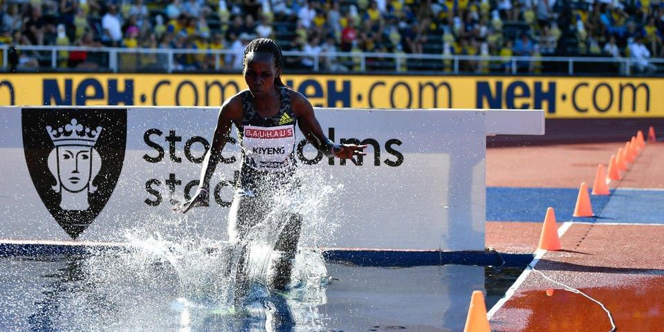 Kenya's Hyvin Kiyeng competes to win the women's final 3000 metres steeplechase event during the Wanda Diamond League Track and Field Championships in Stockholm, Sweden on July 4, 2021. - - Sweden OUT (Photo by Christine OLSSON / TT News Agency / AFP) ...