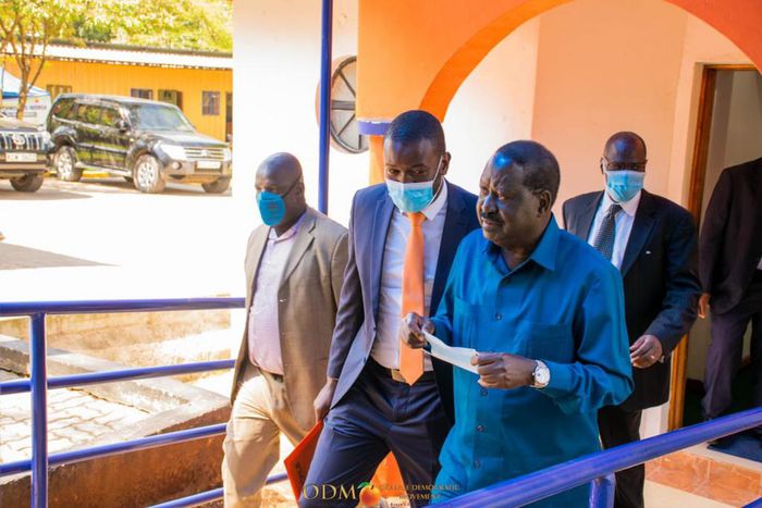 ODM party leader Raila Odinga with Secretary-General Edwin Sifuna