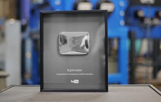 Ten Kenyan celebrities with the YouTube silver plaque.
