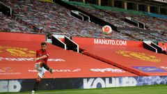 Manchester United's loss of revenue from a whole season behind closed doors has been eased by a return to the Champions League