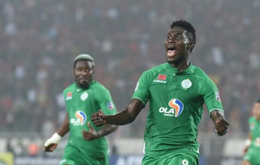Congolese Ben Malango (R) scored for Raja Casablanca of Morocco in a 3-0 CAF Confederation Cup victory over Pyramids of Egypt in Cairo