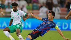 Japan's Maya Yoshida (R) was involved in a confrontation with Saudi Arabia fans after his side's 1-0 qualifying defeat