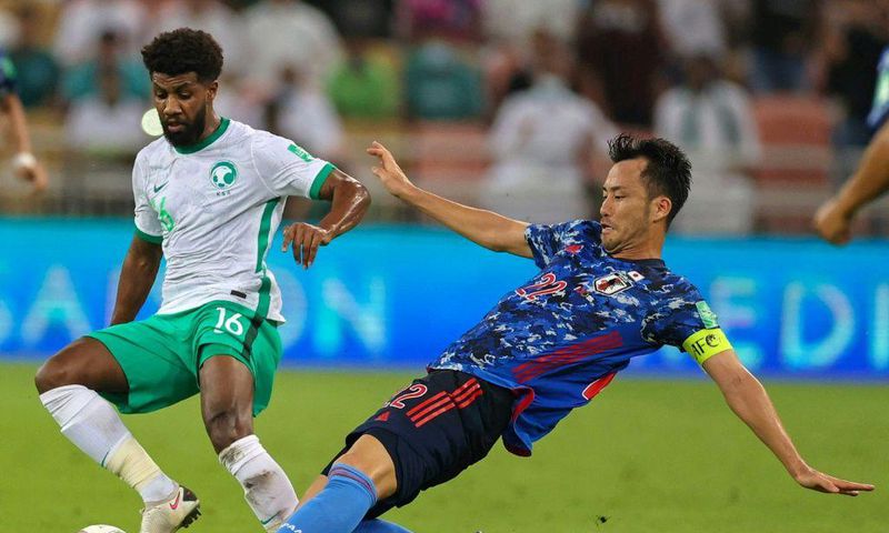 Japan's Maya Yoshida (R) was involved in a confrontation with Saudi Arabia fans after his side's 1-0 qualifying defeat