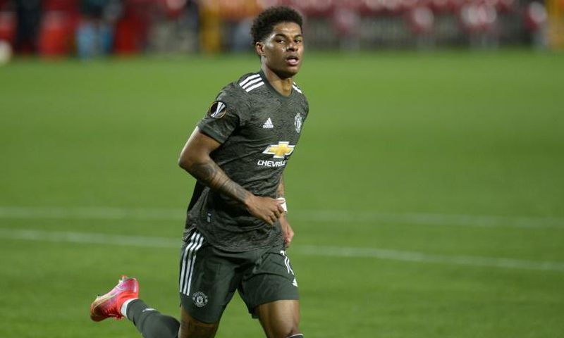 On target: Manchester United's Marcus Rashford celebrates