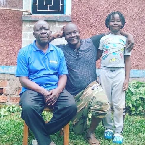 Radio Presenter Amani Aila and his father