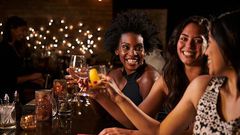 Toasting. Visit DrinkIQ.com for more information on responsible drinking