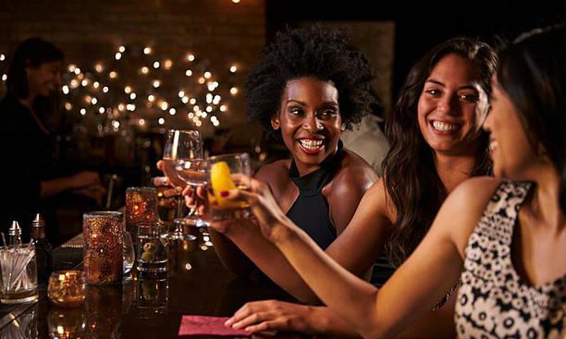 Toasting. Visit DrinkIQ.com for more information on responsible drinking