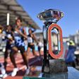 Athletes run by the Diamond League trophy as they compete in the women's 5000m at The Diamond League athletics meeting in Zurich on September 8, 2021 (Photo by Fabrice COFFRINI / AFP) (Photo by FABRICE COFFRINI/AFP via Getty Images)