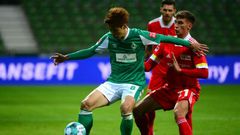 Japan forward Yuya Osako (L) scored the winner in Werder Bremen's German Cup quarter-final victory on Wednesday