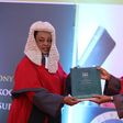 Chief Justice Martha Karambu Koome receives instruments of power and the state of the Judiciary report from Deputy Chief Justice Philomena Mbete Mwilu