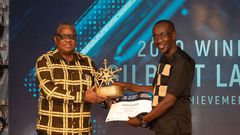 KPA Ag. Managing Director Amb. John Mwangemi (left) handing over certificate to winner of Lifetime Achievement Award Gilbert Langat at the EAMA 2020 Awards