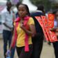 An Aids Healthcare Foundation-Kenya worker distributes condoms in the streets of Nairobi on February 14, 2014 to promote safe sex practices during the Valentine week and to mark the International Condom Day. A non-governmental organisation is planning ...