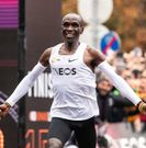 Eliud celebrates with fans after completing the INEOS Challenge on Saturday, October 12 2019 made history by becoming the first-ever human to complete a 42-kilometer marathon under two hours at the INEOS Challenge in Vienna, Austria.