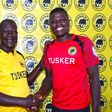 Tusker F.C head coach Robert Matano (left) welcomes new signing Patrick Matasi (right).