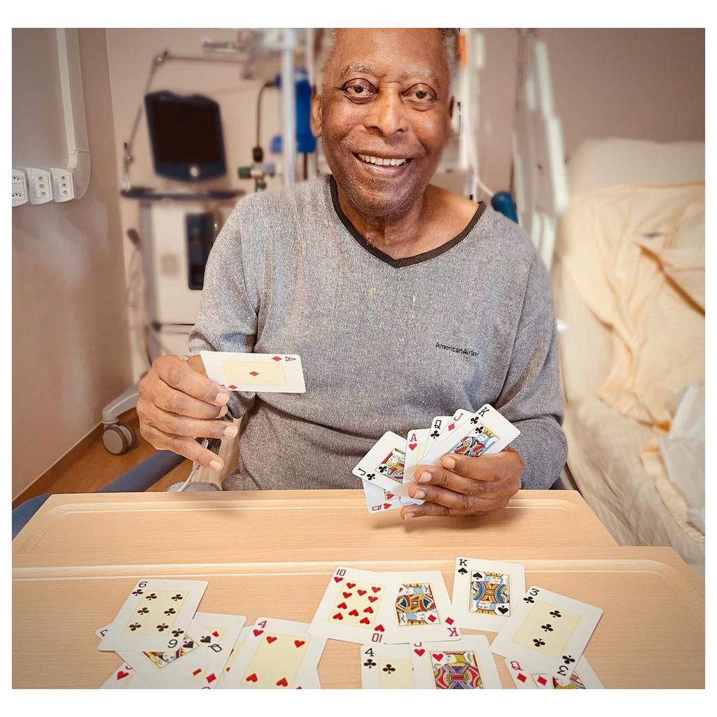 Pele's daughter Kely Nascimento has provided fans with updates on her father's condition during his hospital stay, posting pictures and videos on social media -- of them playing cards, or the footballer singing the anthem of Santos, his former club.
