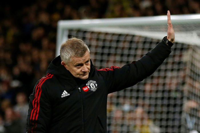 Is this goodbye? Ole Gunnar Solskjaer waves to Manchester United supporters after the 4-1 defeat at Watford on Saturday. The fans reacted by booing the manager