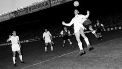 First to the ball: Raymond Kopa of Real Madrid holds off Michel Leblond of Reims in the first European Cup final in Paris in June 1956