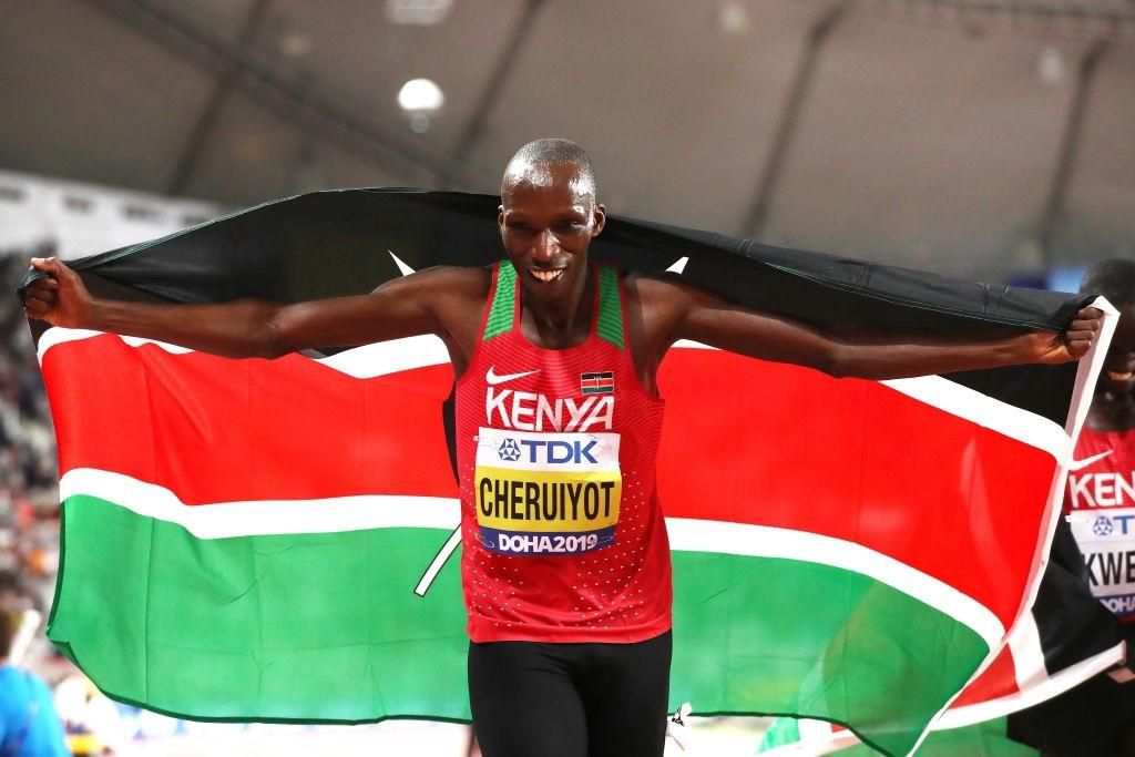 DOHA, QATAR - OCTOBER 06: Timothy Cheruiyot of Kenya celebrates winning gold in the Men's 1500 metres final during day ten of 17th IAAF World Athletics Championships Doha 2019 at Khalifa International Stadium on October 06, 2019 in Doha, Qatar. (Photo by Alexander Hassenstein/Getty Images for IAAF)