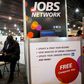 FILE PHOTO: A job-seeker completes an application at a career job fair in Philadelphia, Pennsylvania, U.S. July 25, 2013.  REUTERS/Mark Makela/File Photo   GLOBAL BUSINESS WEEK AHEAD