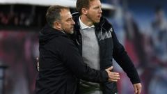 Leipzig head coach Julian Nagelsmann (R) hopes to put pressure on Bayern Munich and their boss Hansi Flick (L)