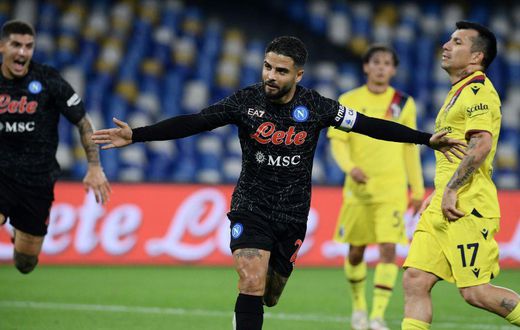 Two of a kind: Napoli's Lorenzo Insigne celebrates after scoring a second penalty