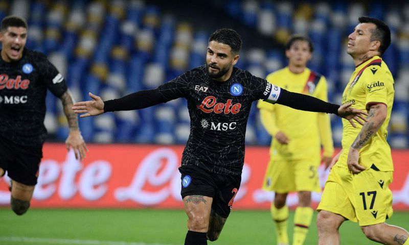 Two of a kind: Napoli's Lorenzo Insigne celebrates after scoring a second penalty