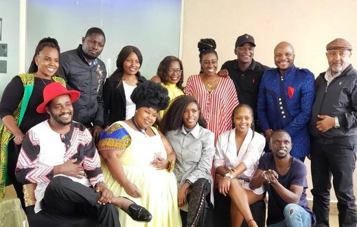 The cast of Papa Shirandula celebrating the death anniversary of Charles Bukeko