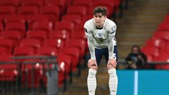 England defender John Stones reacts after his error led to Poland's equaliser in their World Cup qualifier at Wembley