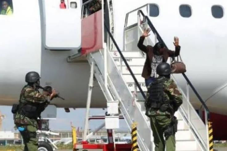 Police officers conducting a security drill at JKIA