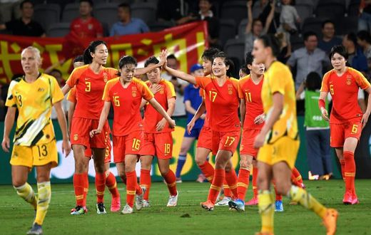 China's players celebrate scoring against Australia during the women's Olympic football tournament in Sydney in February last year. Now more than a year later they have the chance to complete their quest for an Olympic place when they face South Korea