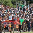 The portrait and coffin of the late Tanzanian President John Magufuli is seen during his national funeral in Dodoma