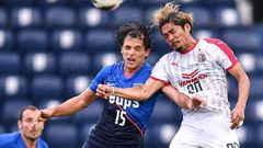 Yoshito Okubo of Cerezo Osaka outjumped Roberto of Kitchee as the Japanese club gained the point they needed to advance in the Asian Champions League