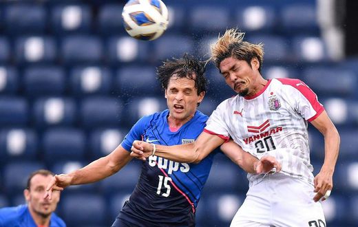 Yoshito Okubo of Cerezo Osaka outjumped Roberto of Kitchee as the Japanese club gained the point they needed to advance in the Asian Champions League