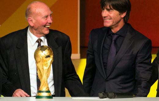 Horst Eckel, a 1954 World Cup winner, with former Germany coach Joachim Loew (R) in 2015