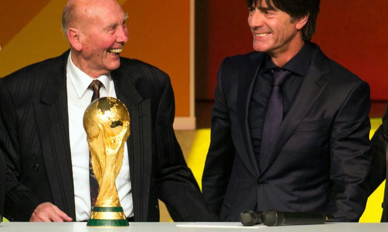 Horst Eckel, a 1954 World Cup winner, with former Germany coach Joachim Loew (R) in 2015