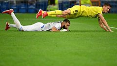Villarreal defender Juan Foyth and Real Madrid's Karim Benzema battle for the ball during Saturday's game in La Liga.