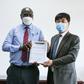 KeNHA Director General Eng. Peter Mundinia with representative from China Communication Construction Company (CCCC)