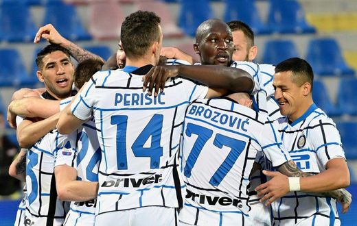 Inter players celebrate after Christian Eriksen put them ahead against Crotone