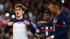 France forward Antoine Griezmann (left) and Kylian Mbappe celebrate as the French secured their World Cup qualification