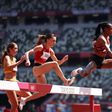 TOKYO, JAPAN - AUGUST 01: Beatrice Chepkoech of Team Kenya runs ahead of Luiza Gega of Team Albania in round one of the Women's 3000m Steeplechase heats on day nine of the Tokyo 2020 Olympic Games at Olympic Stadium on August 01, 2021 in Tokyo, Japan. ...