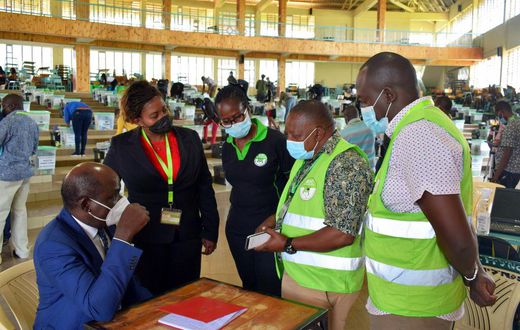 IEBC Chairperson Wafula Chebukati with elections officials at Mang'u Tallying Centre