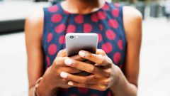 Closer up of woman using smart phone