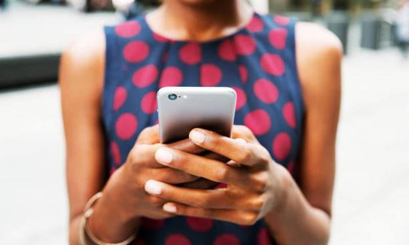 Closer up of woman using smart phone