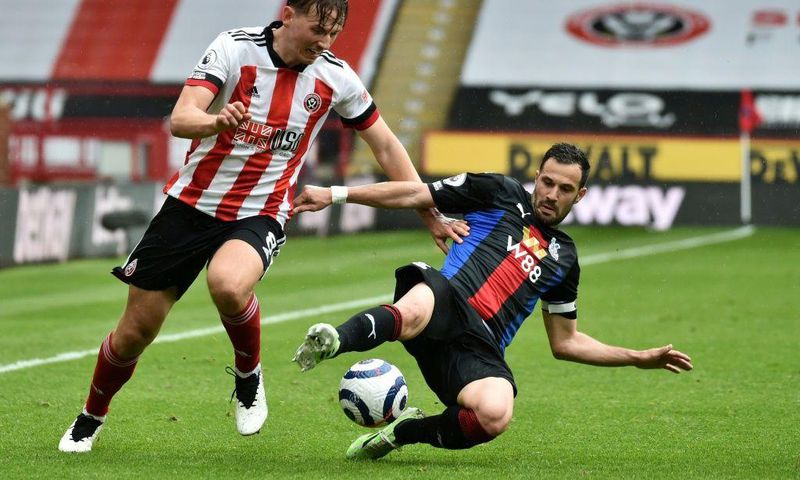 Sheffield United midfielder John Fleck has tested positive for coronavirus and is to self-isolate at Scotland's pre-Euro 2020 training camp in Spain the Scottish Football Association announced