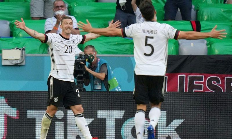 Robin Gosens (L) celebrates scoring Germany's fourth goal in Munich on Saturday at Euro 2020