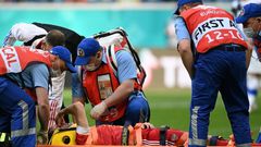 Fernandes had to be stretchered off in a neck brace after falling awkwardly